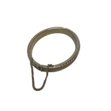 Vintage Gold-Tone Hinged Bangle Bracelet With Safety Chain Textured Design Elegant Style