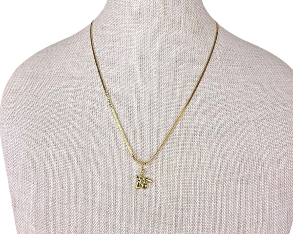 Monet Women's Vintage Gold Tone Bowling Charm Necklace Snake Chain Elegant Jewelry