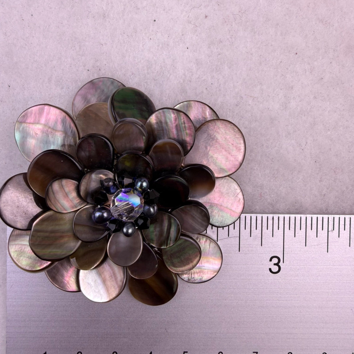 Mother Of Pearl Floral Brooch Black Iridescent Faceted Stone Centerpiece