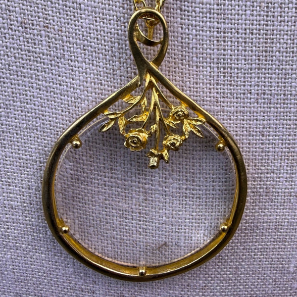 Womens Gold Tone Necklace Magnifying Glass Pendant With Rose Embellishments