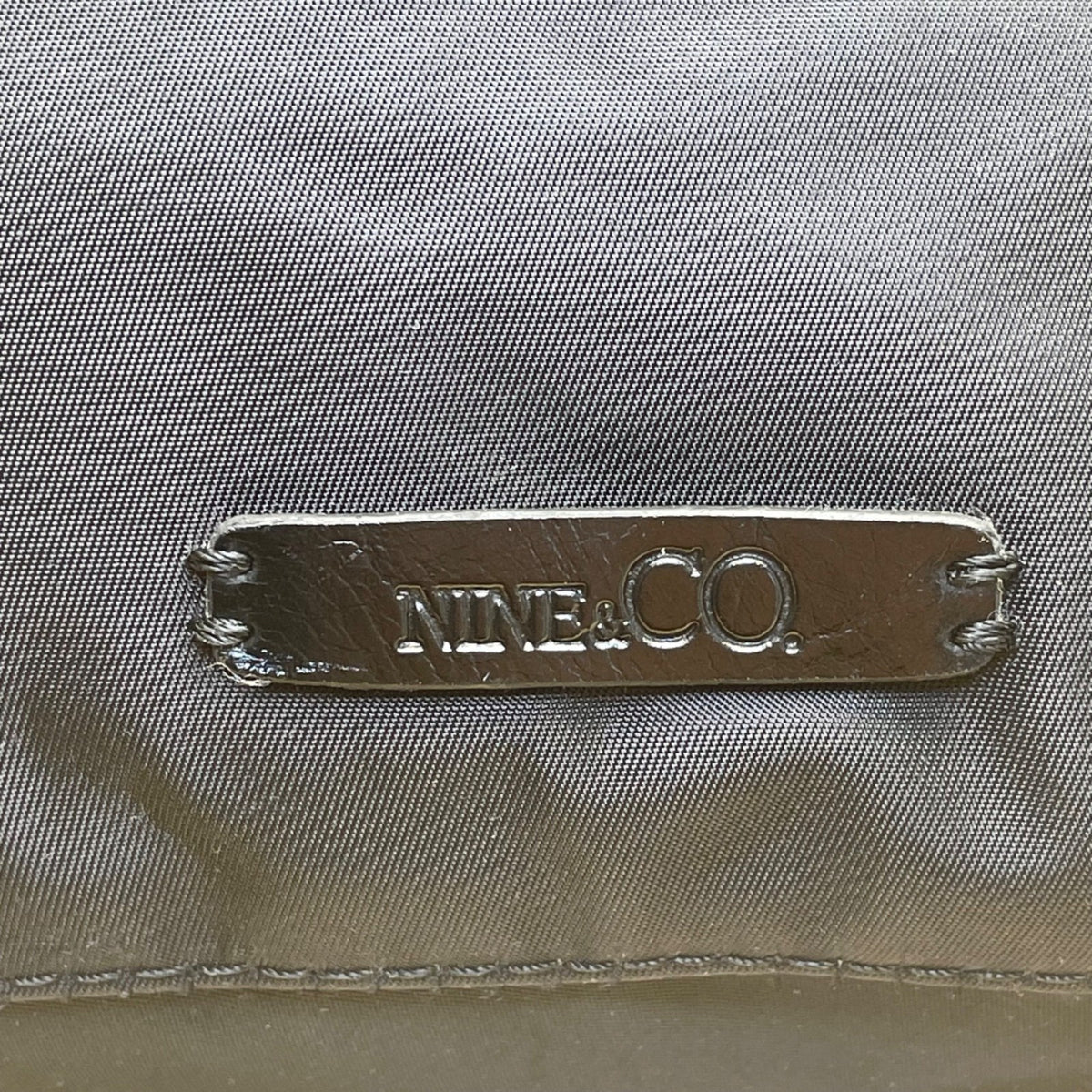 Nine & Co Women’s Black Nylon With Front Pockets Adjustable Strap Crossbody Bag