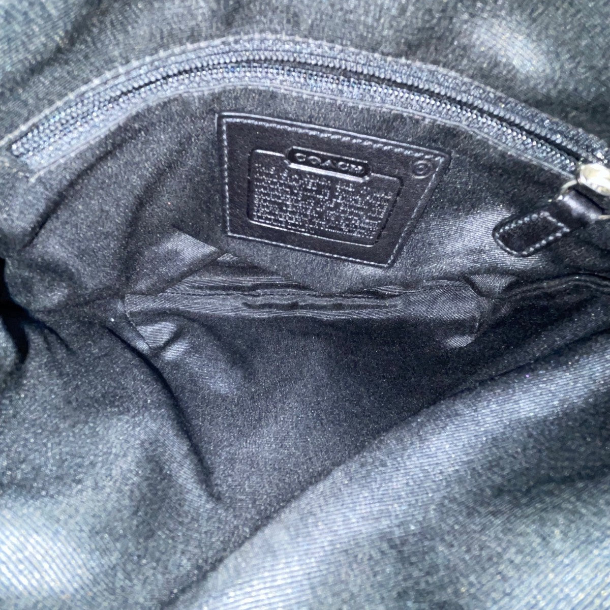 Coach Women’s Black Leather With Tassel Accent & Stitch Detailing Crossbody Bag