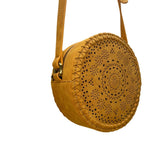 Women’s Mustard Vegan Leather Laser-Cut Adjustable Strap Round Crossbody Bag