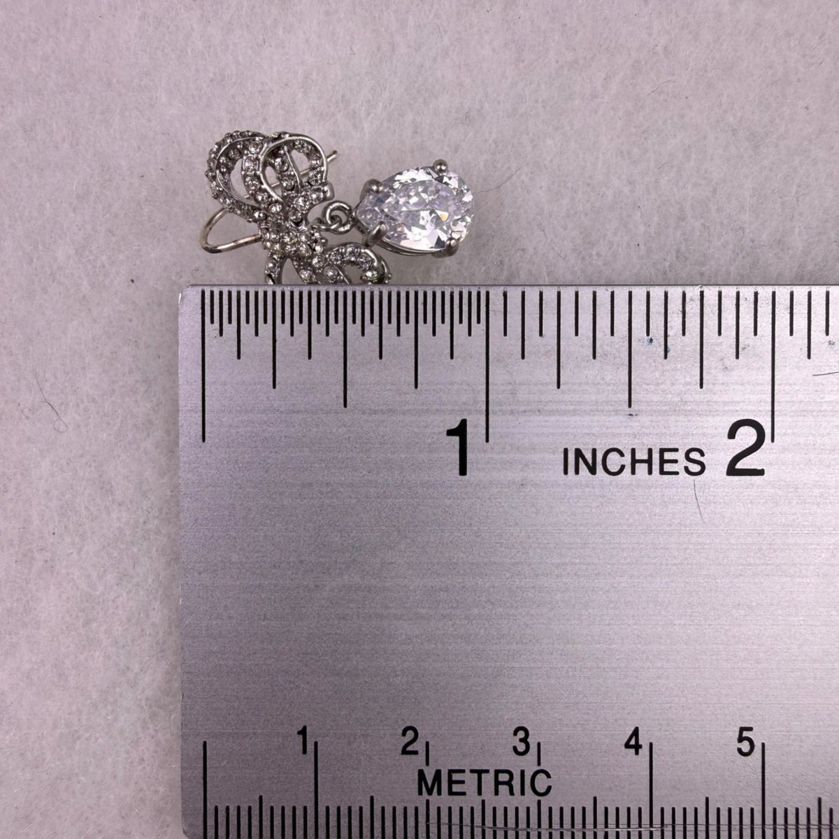 Silver Tone Womens Bow Drop Earrings W/ Pear-Shaped Rhinestone Accent Design