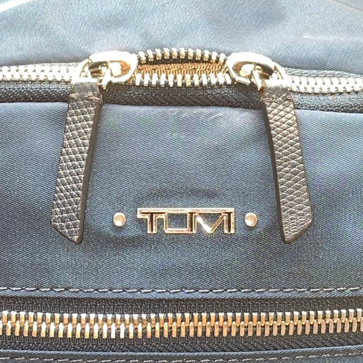 Tumi Women’s Blue Nylon With Multiple Zipper Pockets Adjustable Straps Backpack