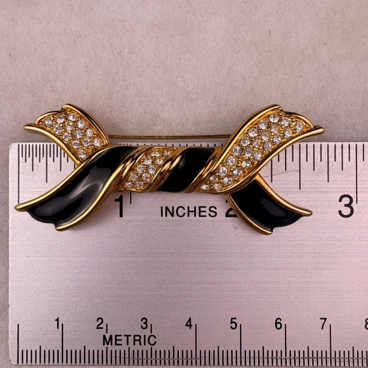 Swarovski Womens Gold Tone Black Enamel Crystal Ribbon Brooch Pin Vintage