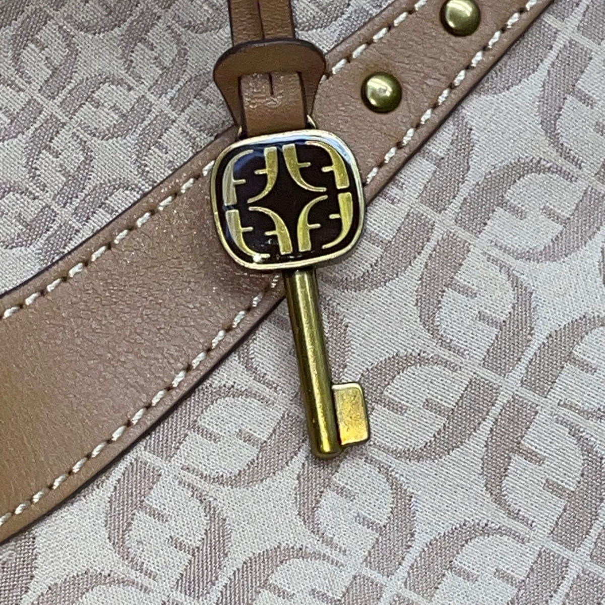 Fossil Women’s Beige Logo Pattern & Brown Leather Trim Adjustable Strap Hobo Bag