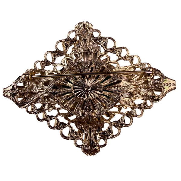 Vintage Unknown Gold-Tone Womens Oval Brooch Dragons Breath Glass Cabochon