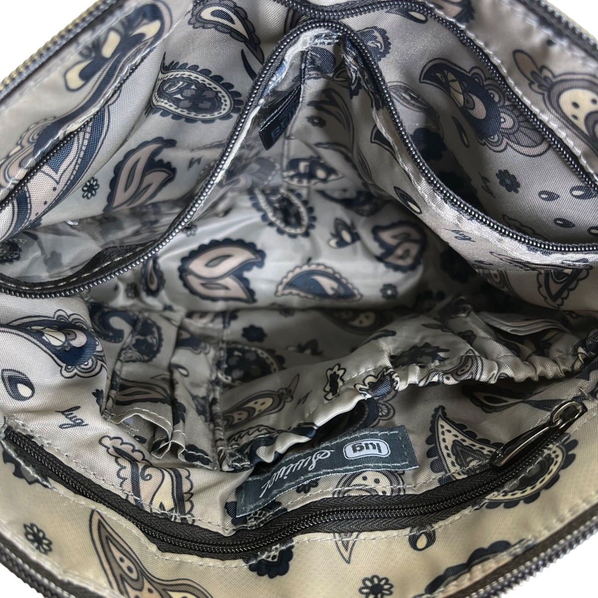 Lug Quilted Black Nylon Adjustable Strap & Zipper Pockets Swivel Crossbody Bag