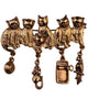 Vintage Womens Gold Tone Metal Cat Brooch With Dangling Charms