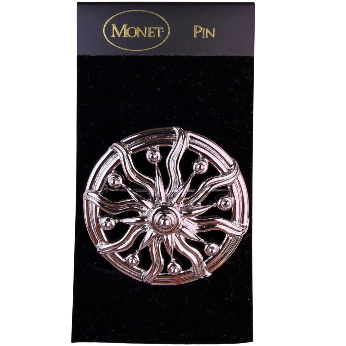 Monet Womens Silver Tone Metal Sunburst Brooch Vintage Filigree Circular Design