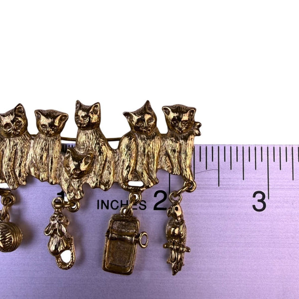 Vintage Womens Gold Tone Metal Cat Brooch With Dangling Charms
