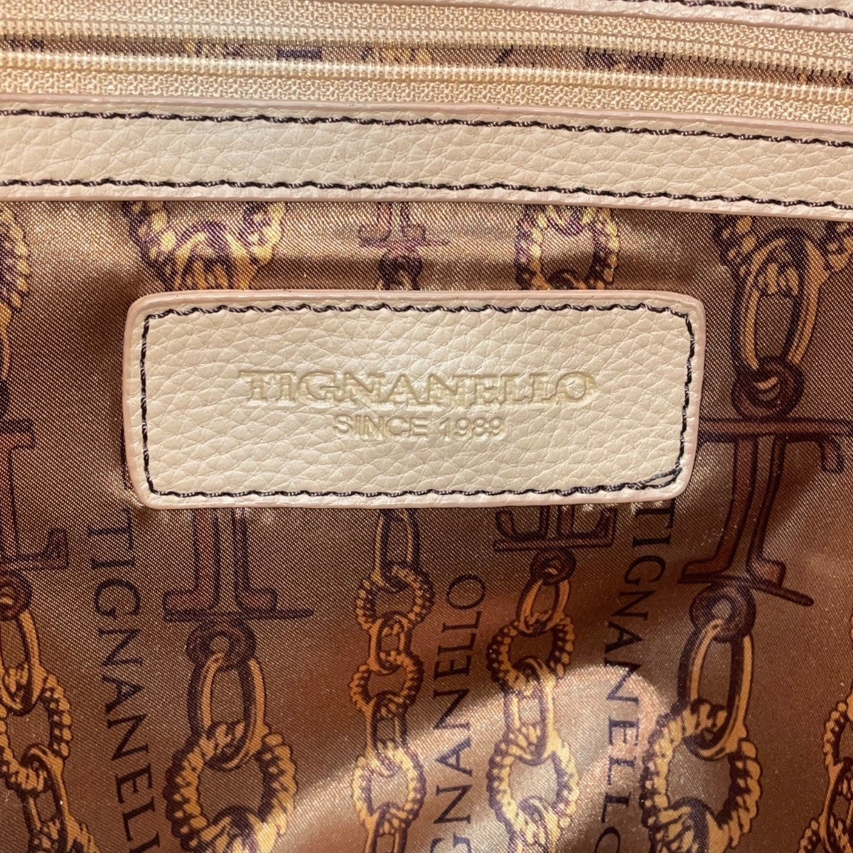 Tignanello Women’s Beige Genuine Leather Pebbled Shoulder Bag With Zip Closure