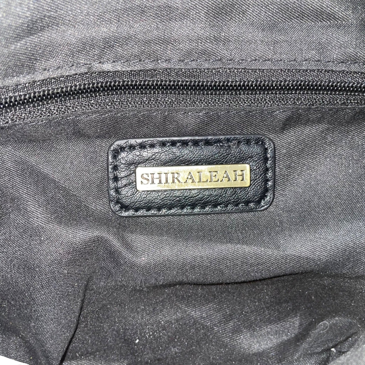 Shiraleah Womens Black Faux Leather Whipstitch Crescent Adjustable Crossbody Bag