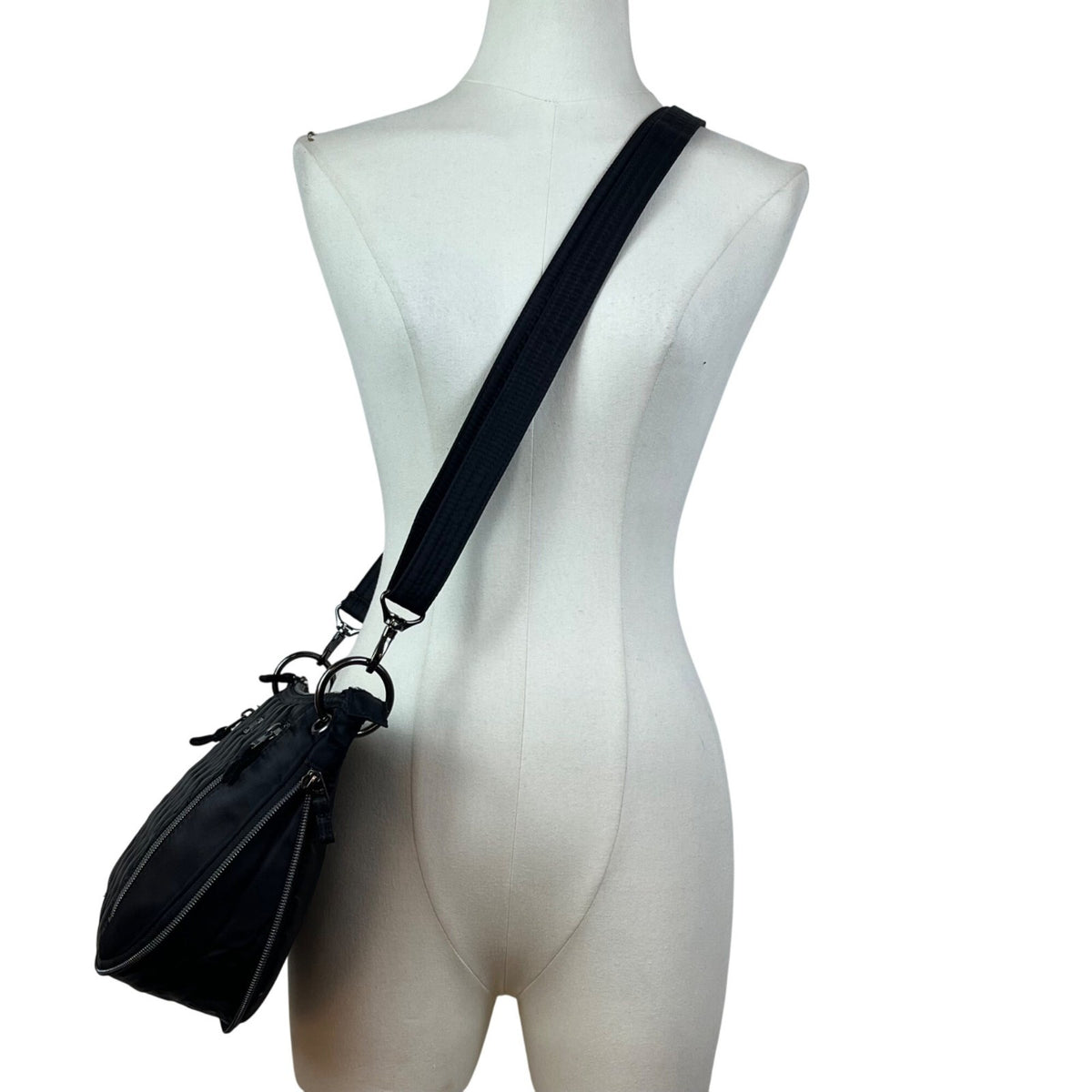 Lug Quilted Black Nylon Adjustable Strap & Zipper Pockets Swivel Crossbody Bag