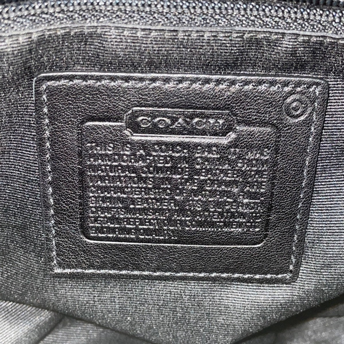 Coach Women’s Black Leather With Tassel Accent & Stitch Detailing Crossbody Bag