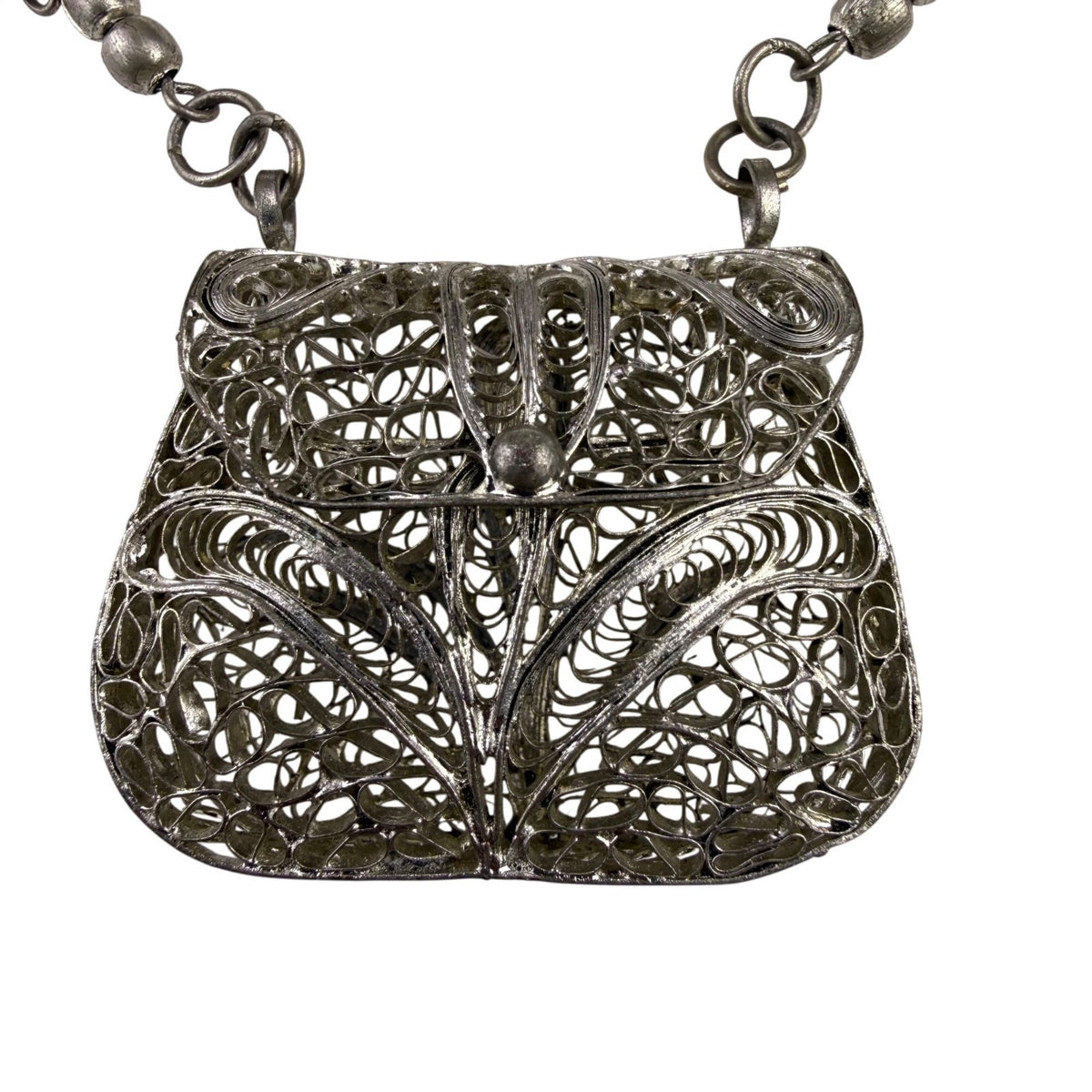 Vintage Silver Tone Metal Pendant Necklace With Ornate Filigree Purse Design