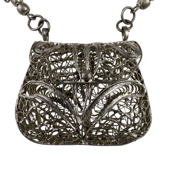 Vintage Silver Tone Metal Pendant Necklace With Ornate Filigree Purse Design