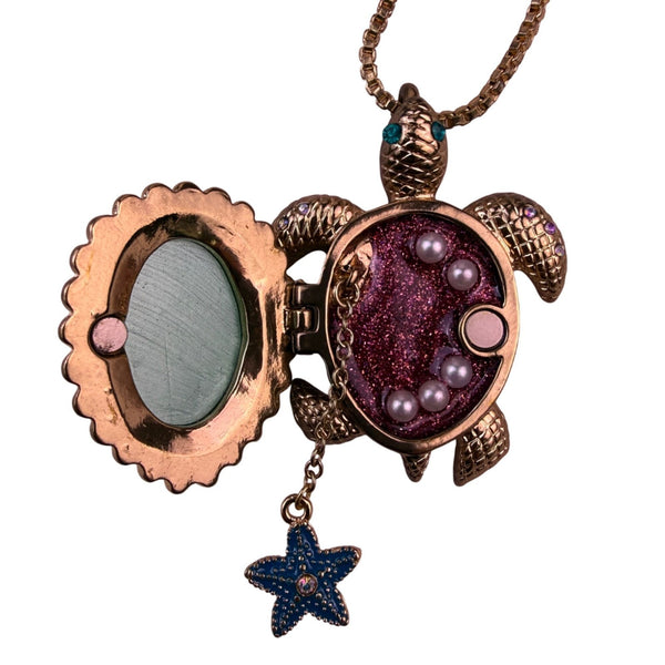 Betsey Johnson Womens Gold Tone Turtle Pendant  With Starfish & Pink Accents