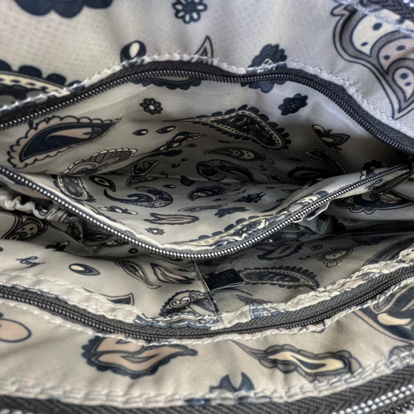 Lug Quilted Black Nylon Adjustable Strap & Zipper Pockets Swivel Crossbody Bag
