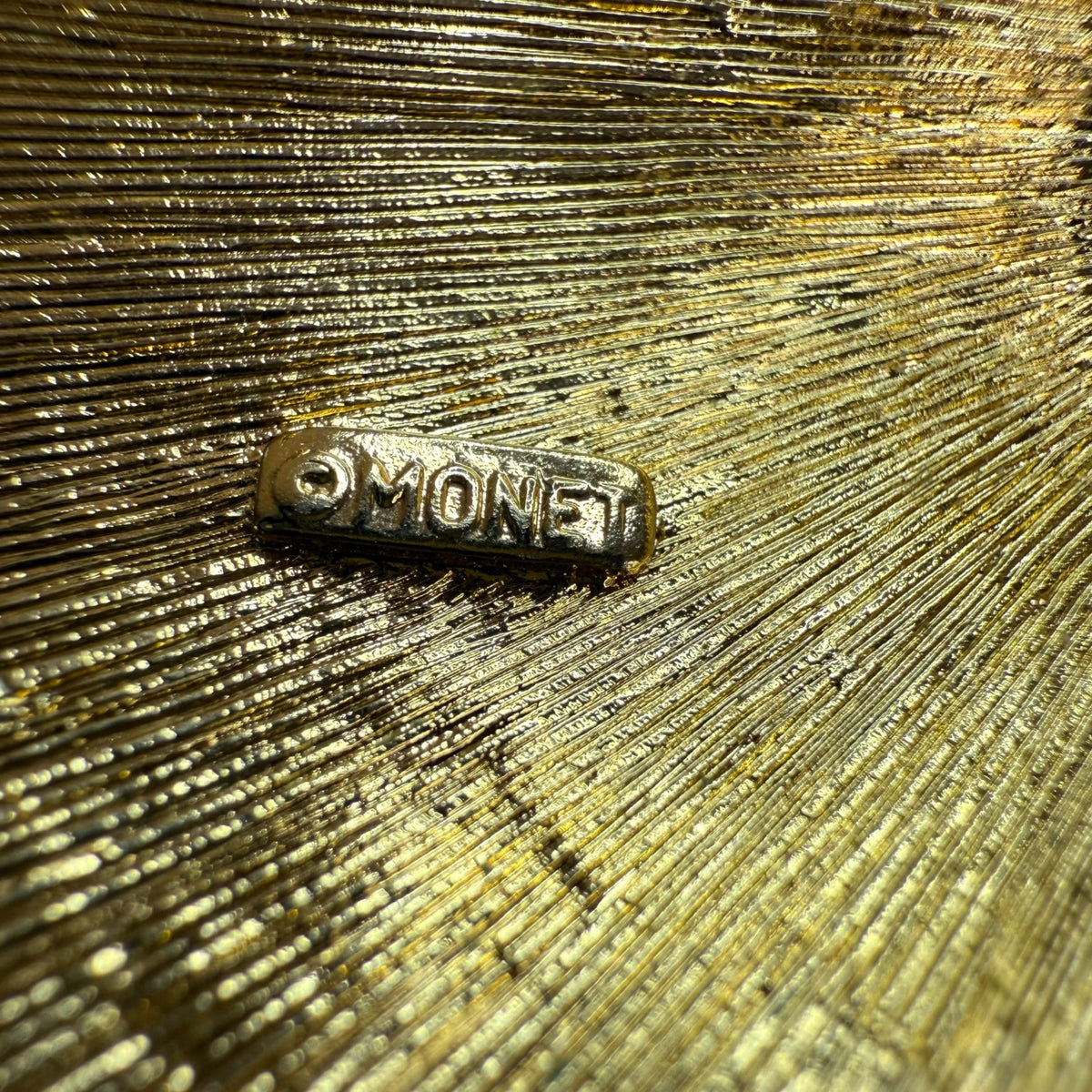 Monet Gold Tone Pin Brooch Vintage Mod Oval Abstract Design Textured Back Signed