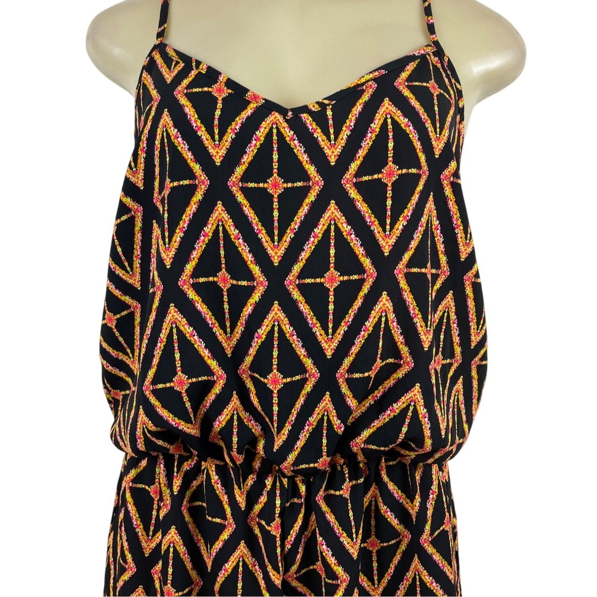 Orange Creek Women's Black Sleeveless Romper With Orange Geometric Print