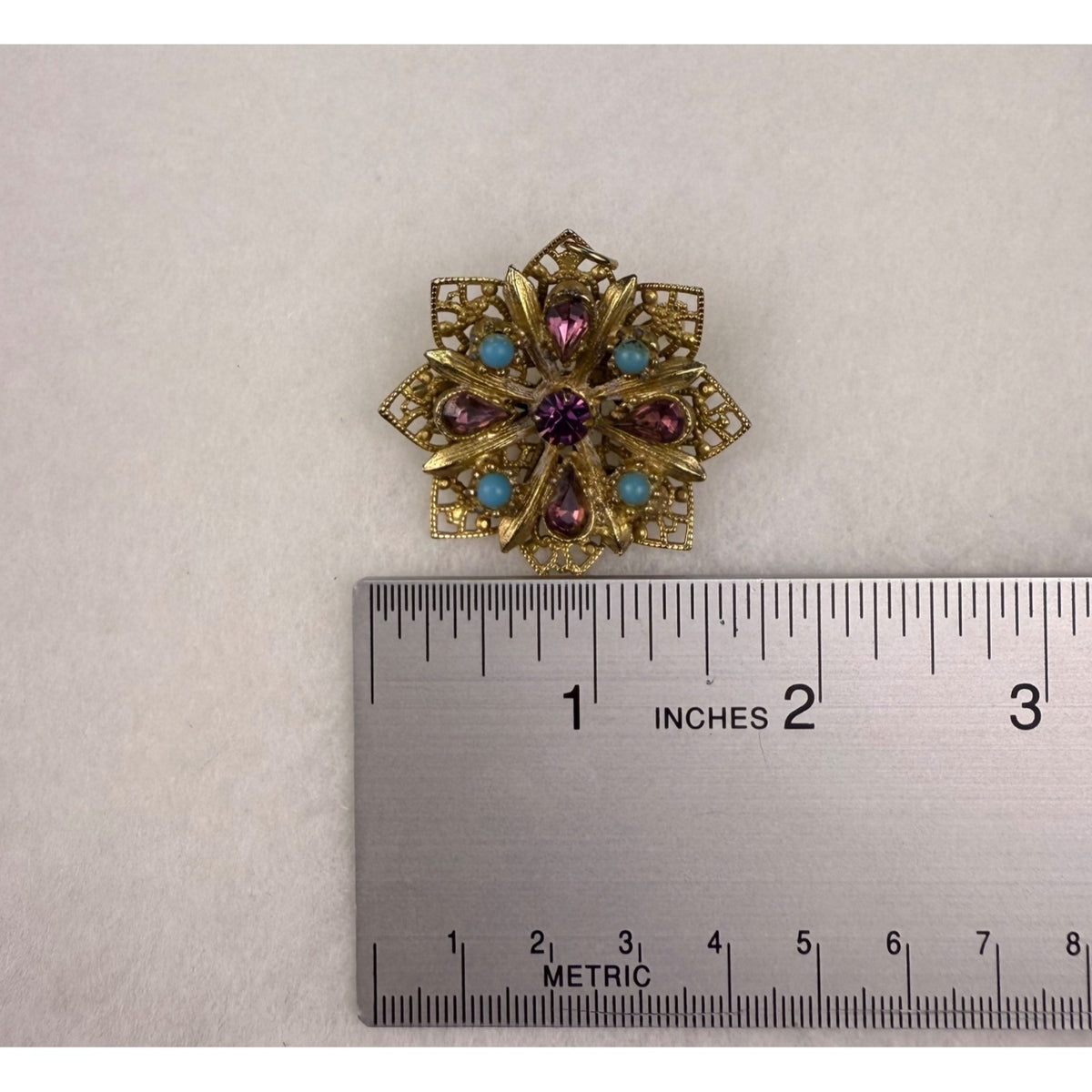 Vintage Gold-Tone Starburst Brooch With Purple & Blue Stones Filigree Design