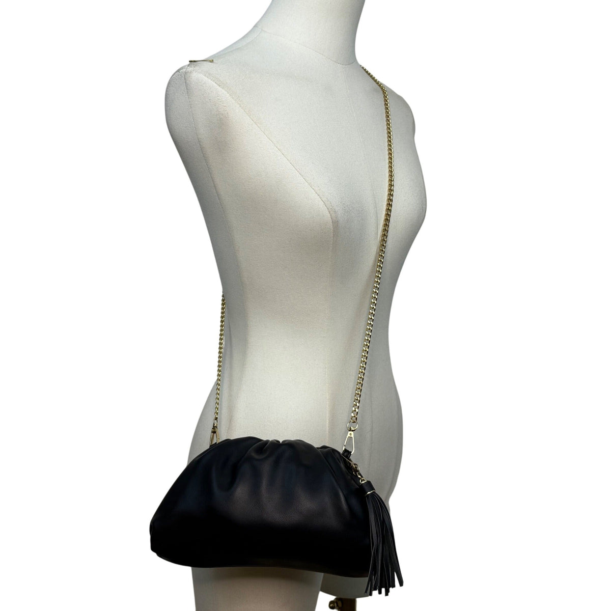 Understated Leather Women’s Black Leather With Tassel Detail & Gold Chain Clutch