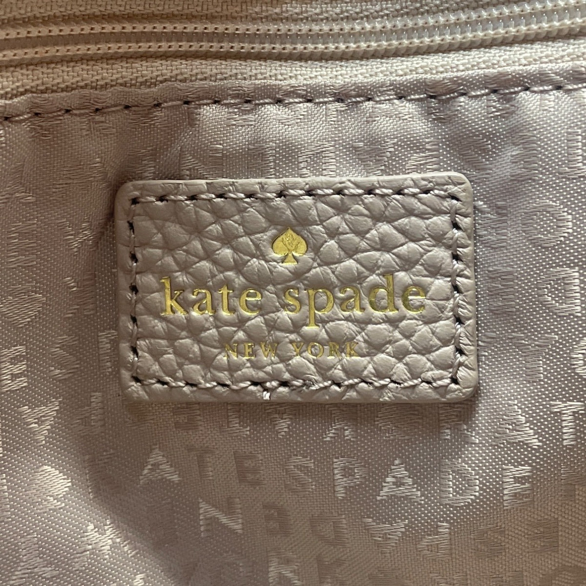 Kate Spade New York Beige Pebbled Leather Tassel Detail Crossbody Bag  Size M