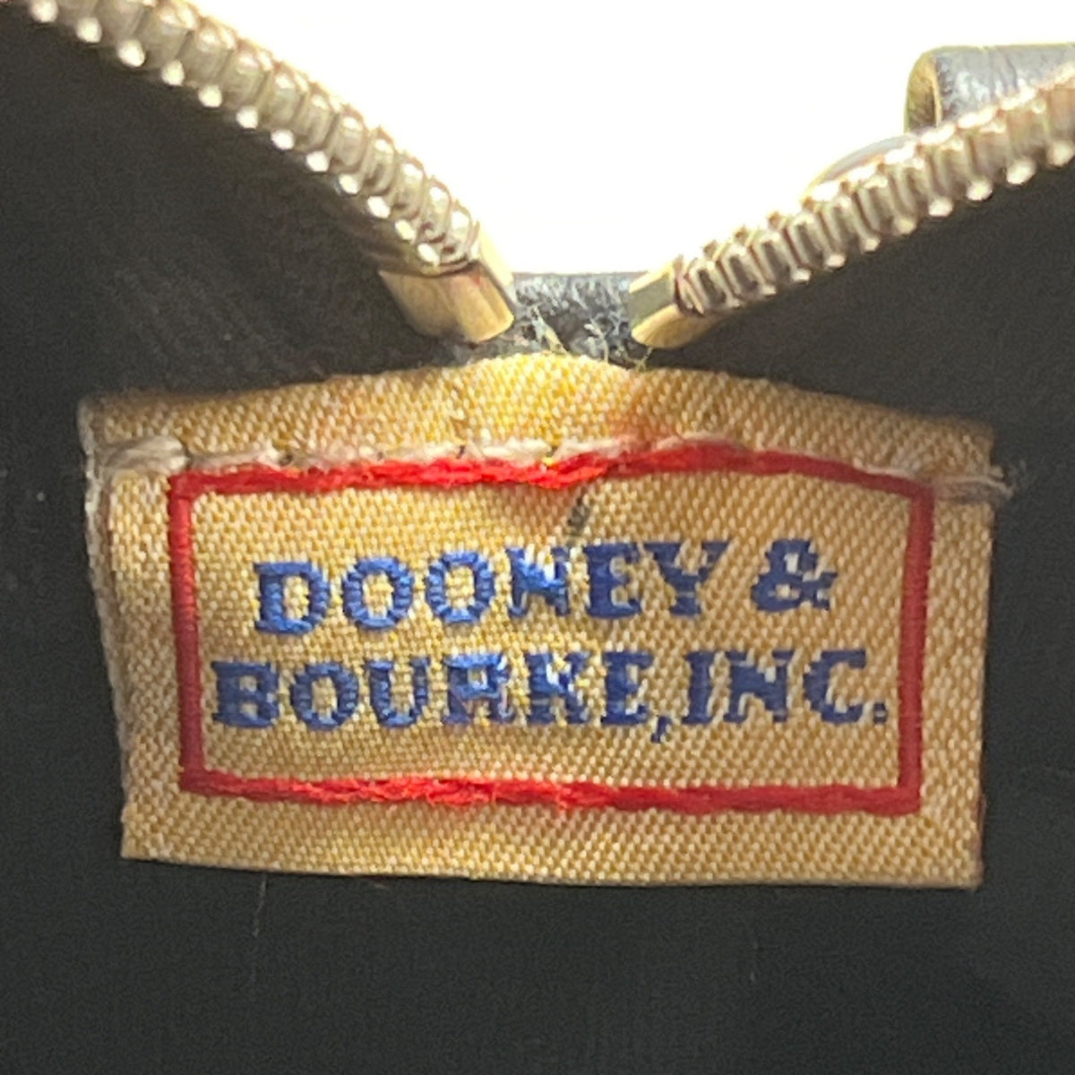 Dooney & Bourke Black Pebbled Leather Tan Trim & Adjustable Strap Crossbody Bag
