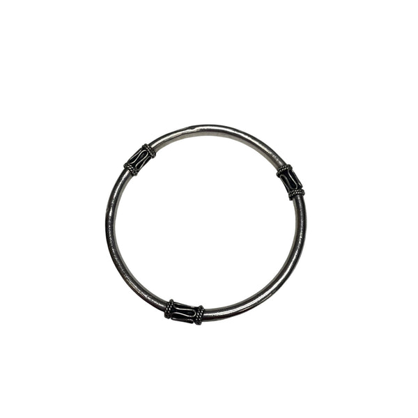 Silver Womans Antiqued Bangle Bracelet With Tribal-Inspired Design Details And Smooth Finish