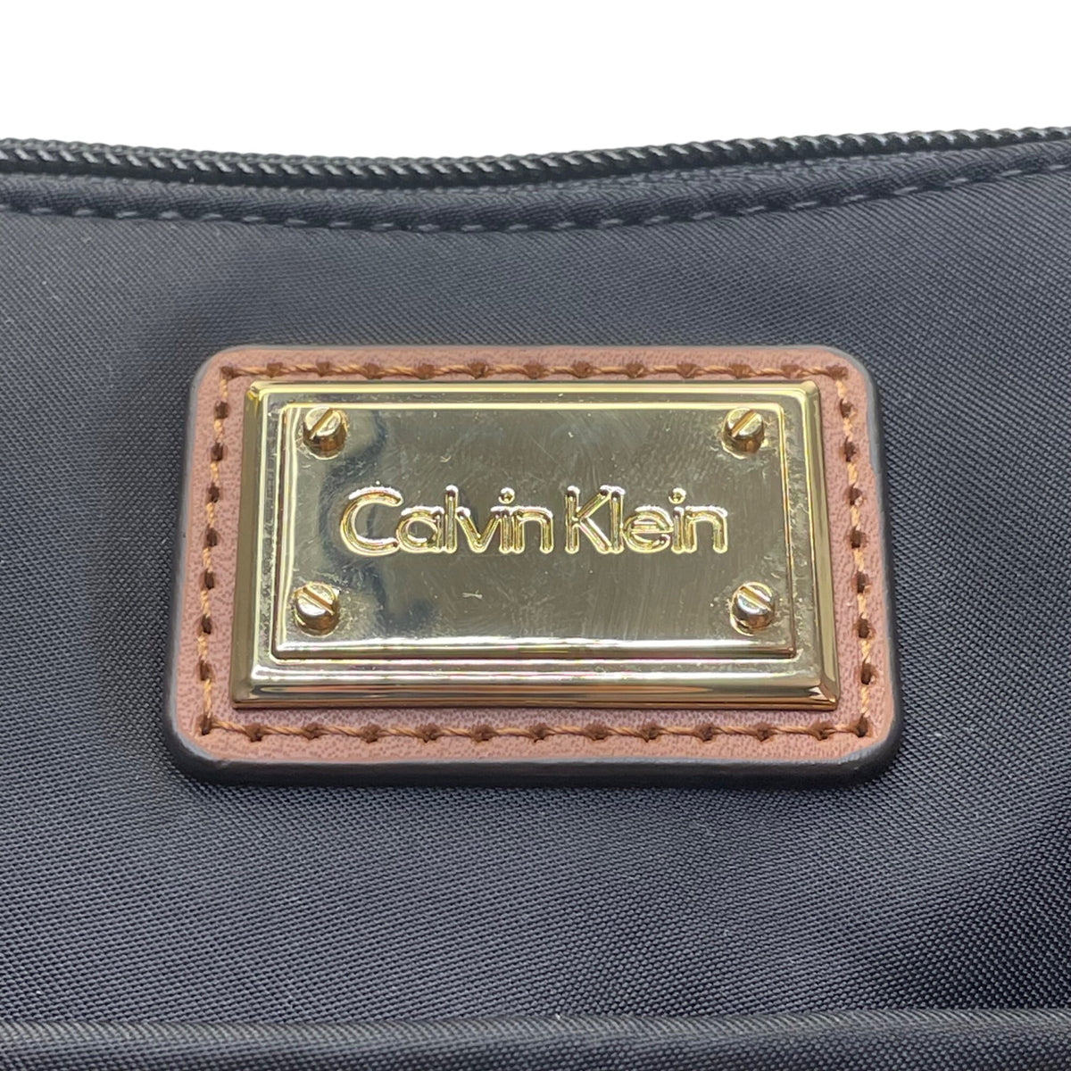 Calvin Klein Women’s Black Nylon Gold Logo Plate Adjustable Strap Crossbody Bag
