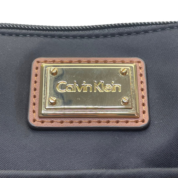 Calvin Klein Women’s Black Nylon Gold Logo Plate Adjustable Strap Crossbody Bag