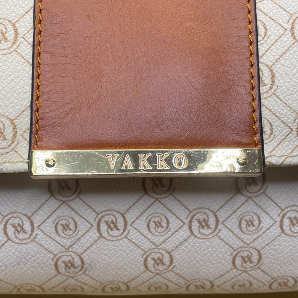 Vakko Women’s Beige/Brown Leather Monogram Tassel Adjustable Strap Crossbody Bag